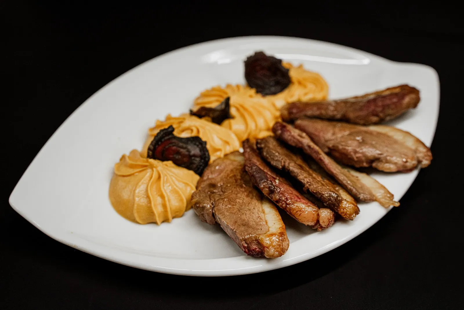 Plat en sauce raffiné pour événement - Traiteur Montpellier